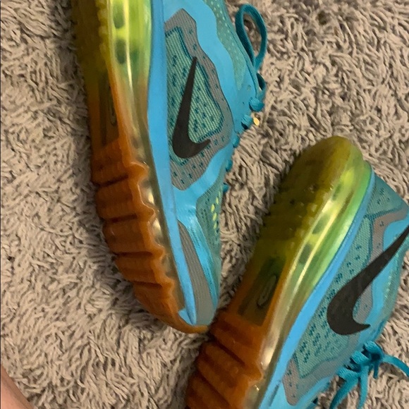 green orange nike shoes